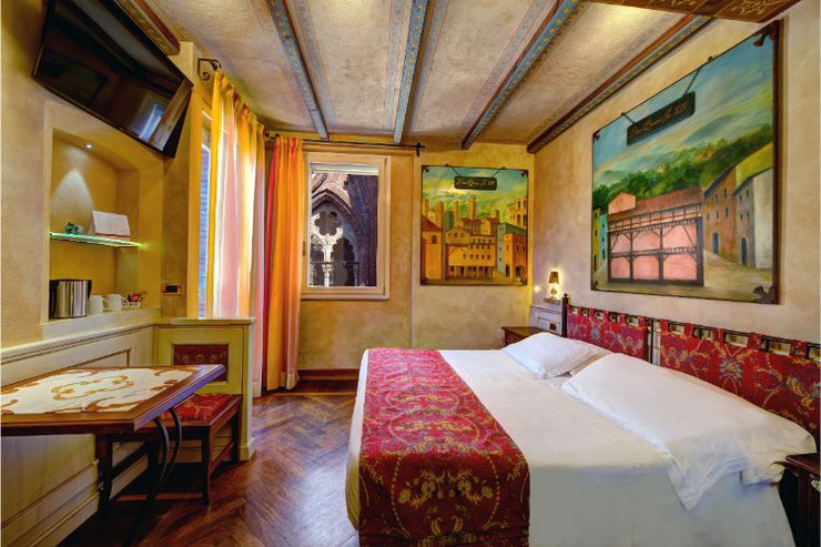 Chambre double deluxe avec terrasse Art Hotel Commercianti Bologne Chambre double deluxe avec terrasse Art Hotel Commercianti Bologne