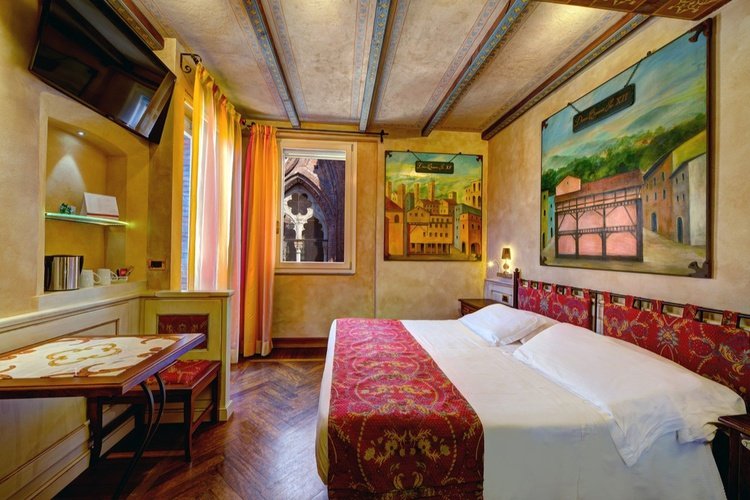 Chambre deluxe  Art Hotel Commercianti Bologne