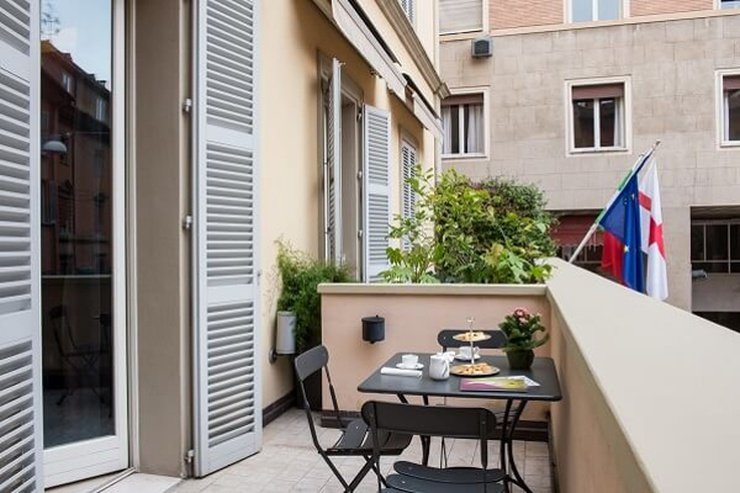 Chambre deluxe balcony art hotel novecento bologne Chambre deluxe balcony art hotel novecento bologne