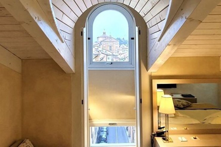 Chambre deluxe penthouse art hotel novecento bologne Chambre deluxe penthouse art hotel novecento bologne